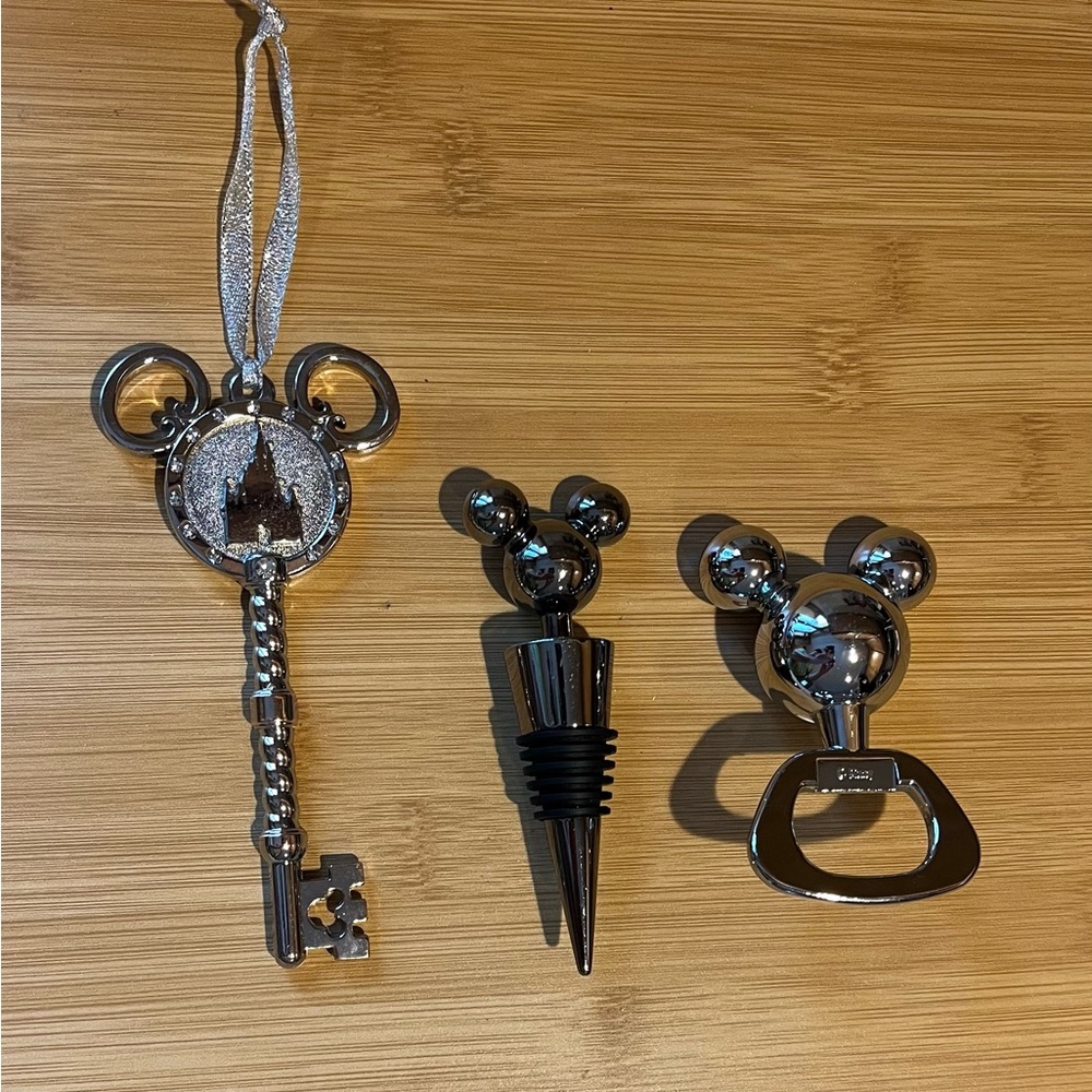 Disney 2017 Cinderella Key and solid Bottle opener and Wine stopper.